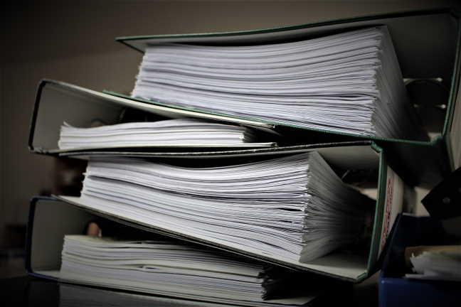 Stack of Binders Full of Papers